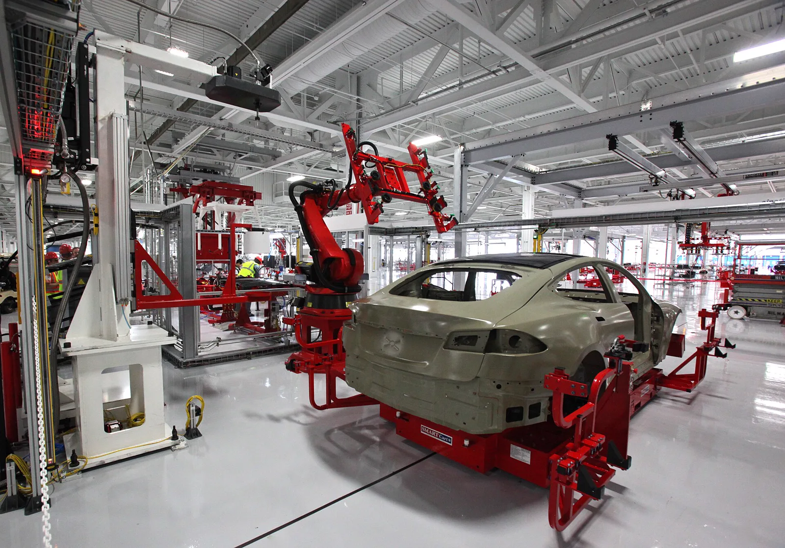Industrial robots working on a vehicle assembly line